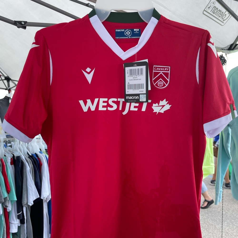 Womens  XS red Macron official jersey. Quick wick